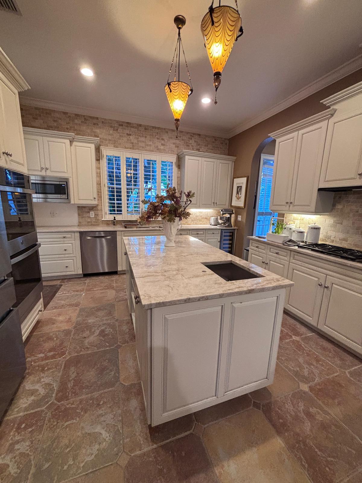 Walnut kitchen with marble island